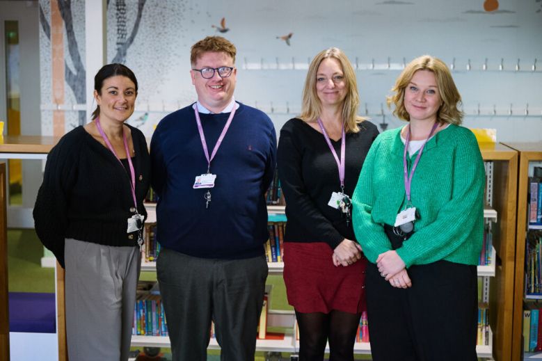 4 members of school staff