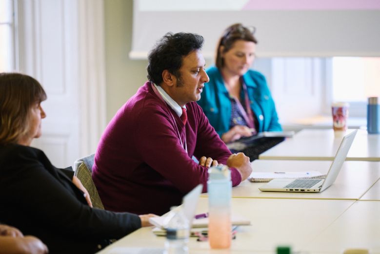 trust leaders in a meeting